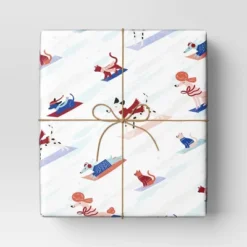 30” 25 Sq Ft Christmas Roll Wrap Dogs Sledding On Cream - Wondershop™