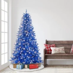 6.5ft Puleo Pre-Lit Blue Artificial Christmas Tree Clear Lights: Flame-Retardant, Hinged Branches, Easy Setup -Northlight Sale GUEST 5a5feb12 a67f 4dba 8ce4 afbf9899c8f5