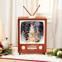 Northlight LED Lighted Musical Snowing Reindeer TV Set Christmas Decoration - 12"