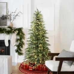 LuxenHome 6.5Ft Pre-Lit Green Cypress Artificial Christmas Tree With Metal Stand 16 LuxenHome 6.5Ft Pre-Lit Green Cypress Artificial Christmas Tree With Metal Stand -Northlight Sale GUEST c2aba39a c161 43f5 b64d 54d9a3e6d045