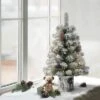 2ft Puleo Pre-Lit Flocked Tabletop Artificial Christmas Tree: Balsam, Hinged Branches, 35 Clear Lights, Metal Pot 1 2ft Puleo Pre-Lit Flocked Tabletop Artificial Christmas Tree: Balsam, Hinged Branches, 35 Clear Lights, Metal Pot -Northlight Sale GUEST e21b474c 197a 4755 a9aa 9e3b78f7c3b4